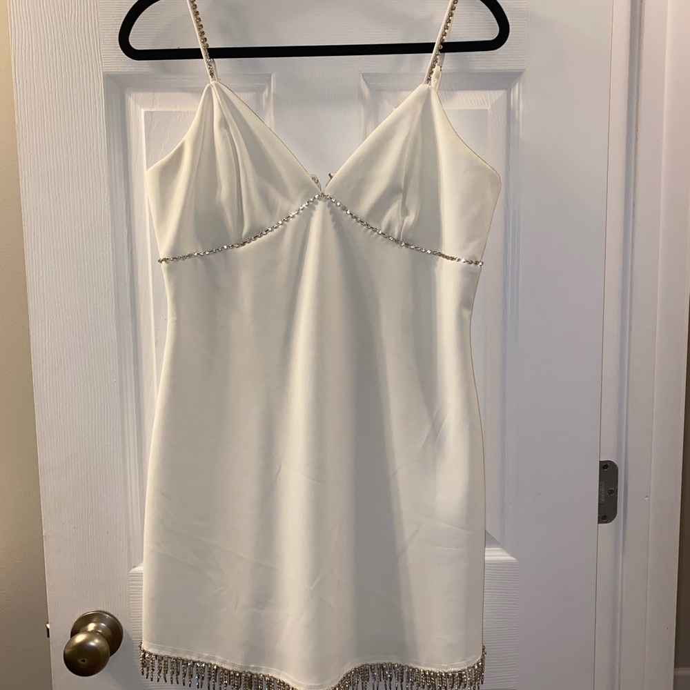 Stylish White Dress with Beaded Trim